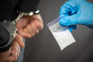 drug offense in tennessee shackled hands and drugs from crime